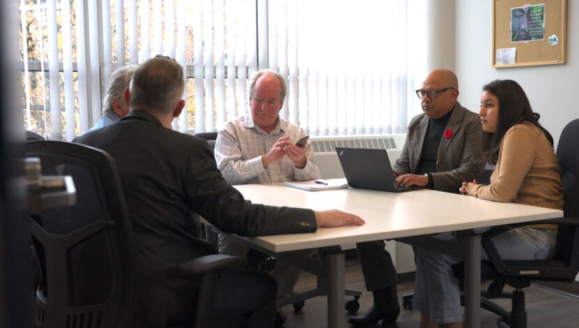 A group of Open Door Group staff and partners.